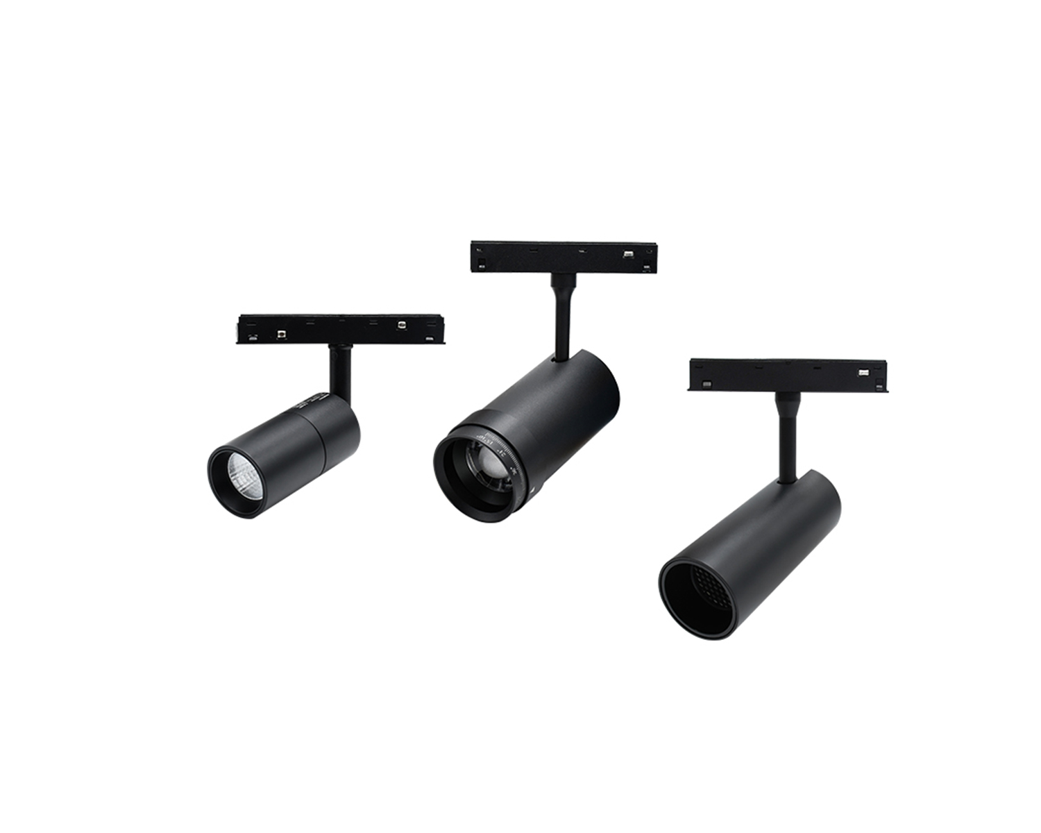 Three black magnetic spotlight heads of different sizes, each on its track adaptor