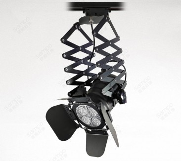 Black PAR30-style track head with barn doors on a scissor arm